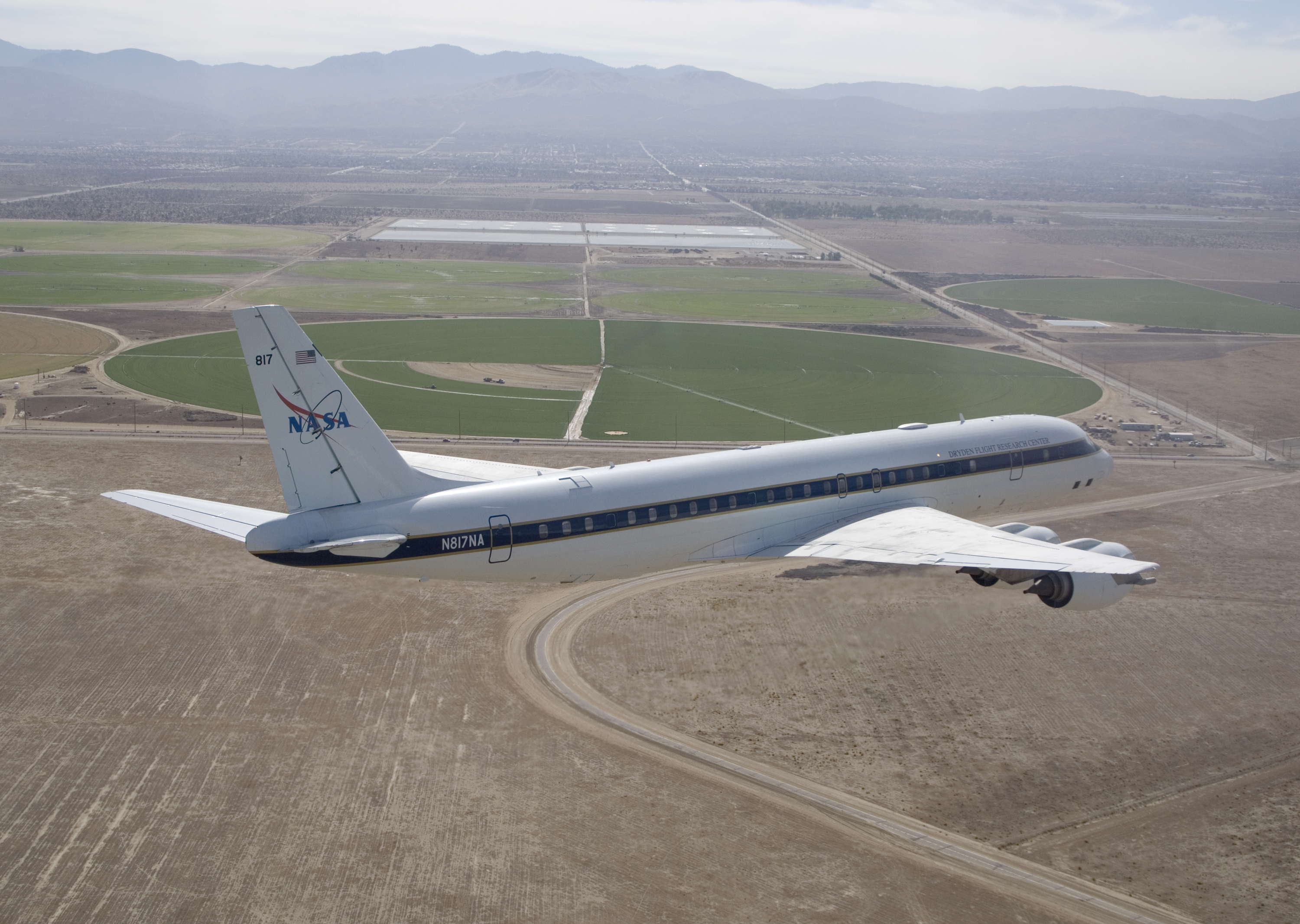 Agricultural fields spread out beyond NASA's DC-8 airborne science laboratory as it heads for landing at Air Force Plant 42 in Palmdale, Calif (ED07-0256-17).jpg